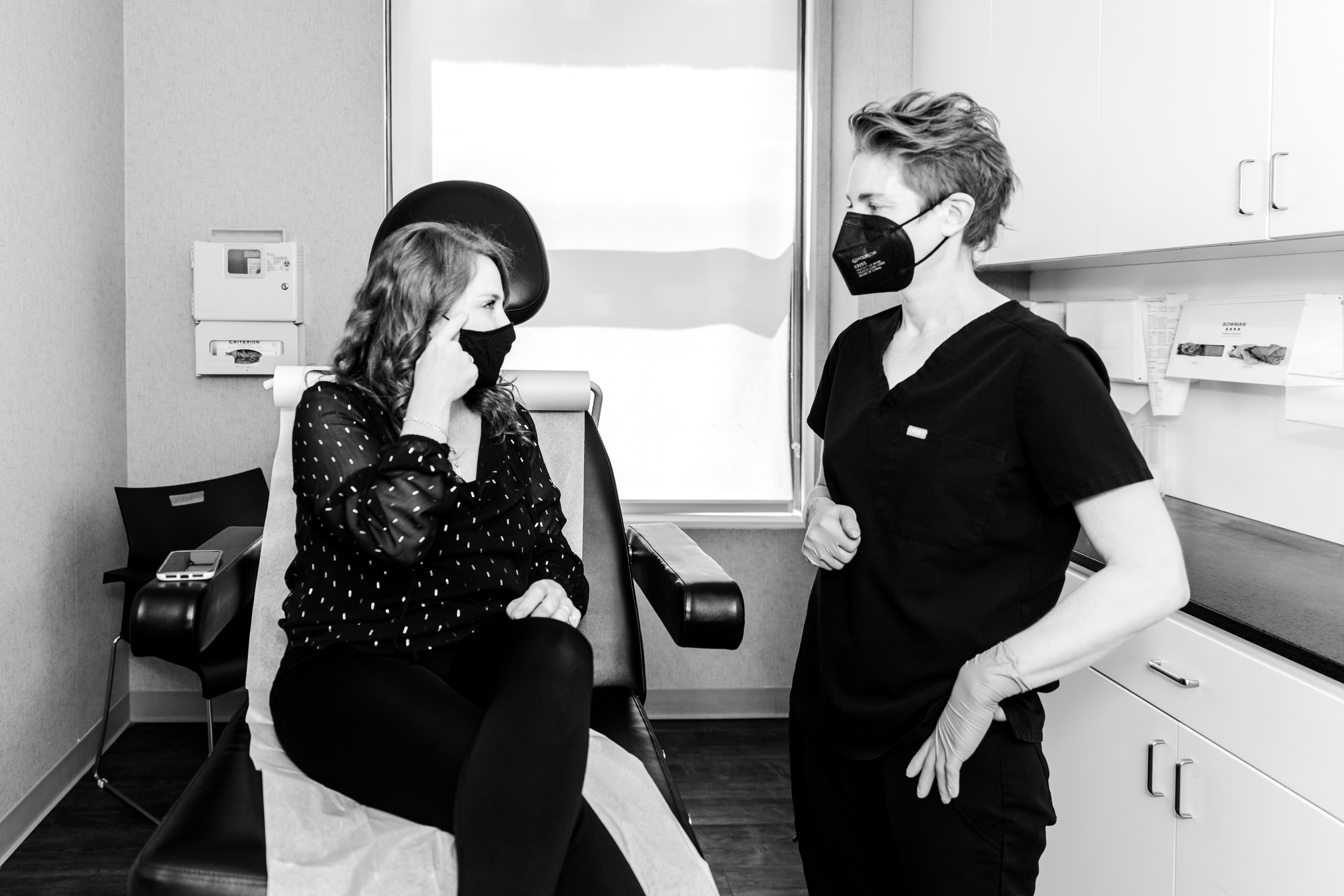 doctor and patient discussing different types of acne